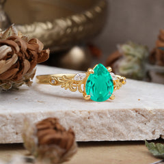 Romantic 4-Prong Pear-Cut Emerald Engagement Ring