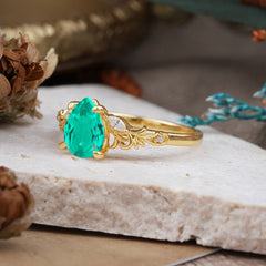 Romantic 4-Prong Pear-Cut Emerald Engagement Ring