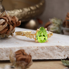 Romantic 4-Prong Pear-Cut Peridot Engagement Ring