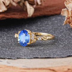 Retro Nature-Inspired 4-Prong Oval-Cut Sapphire Engagement Ring