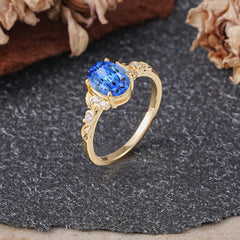 Retro Nature-Inspired 4-Prong Oval-Cut Sapphire Engagement Ring
