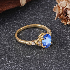 Retro Nature-Inspired 4-Prong Oval-Cut Sapphire Engagement Ring