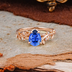 Nature-Inspired Vine-Entwined 4-Prong Teardrop-Cut Sapphire Engagement Ring