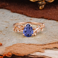 Nature-Inspired Vine-Entwined 4-Prong Teardrop-Cut Tanzanite Engagement Ring