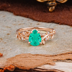 Nature-Inspired Vine-Entwined 4-Prong Teardrop-Cut Emerald Engagement Ring