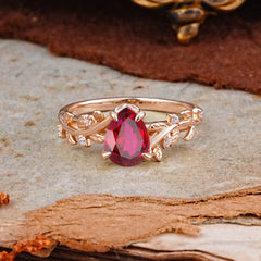 Nature-Inspired Vine-Entwined 4-Prong Teardrop-Cut Ruby Engagement Ring