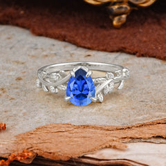 Nature-Inspired Vine-Entwined 4-Prong Teardrop-Cut Sapphire Engagement Ring