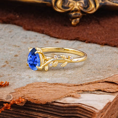 Nature-Inspired Vine-Entwined 4-Prong Teardrop-Cut Sapphire Engagement Ring