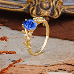Nature-Inspired Vine-Entwined 4-Prong Teardrop-Cut Sapphire Engagement Ring