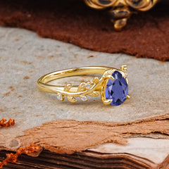 Nature-Inspired Vine-Entwined 4-Prong Teardrop-Cut Tanzanite Engagement Ring
