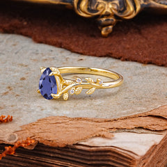 Nature-Inspired Vine-Entwined 4-Prong Teardrop-Cut Tanzanite Engagement Ring