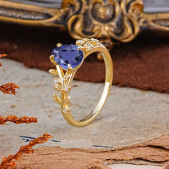 Nature-Inspired Vine-Entwined 4-Prong Teardrop-Cut Tanzanite Engagement Ring