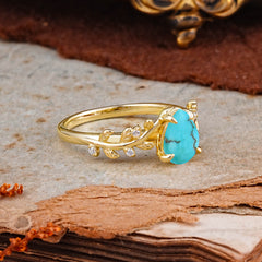 Nature-Inspired Vine-Entwined 4-Prong Teardrop-Cut Turquoise Engagement Ring