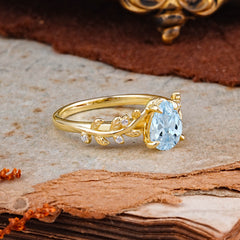 Nature-Inspired Vine-Entwined 4-Prong Teardrop-Cut Aquamarine Engagement Ring