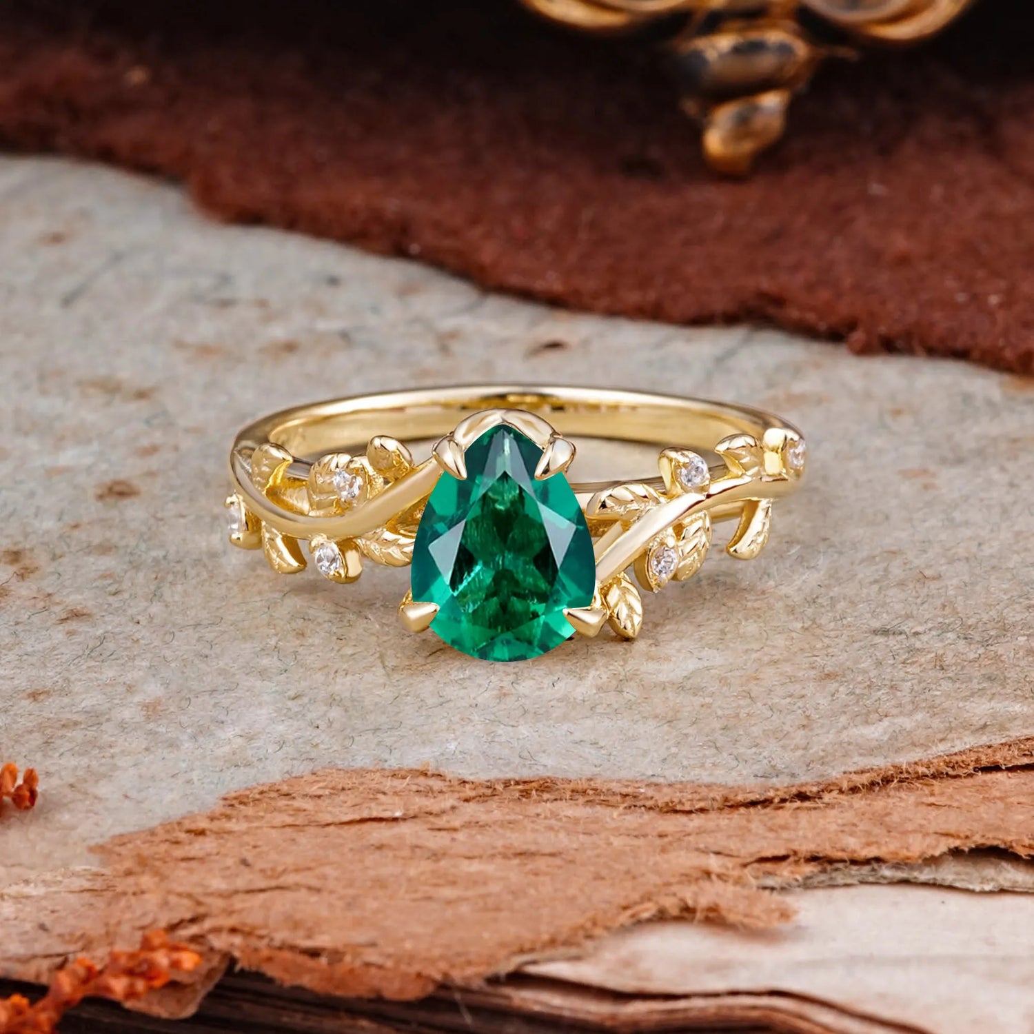 Nature-Inspired Vine-Entwined 4-Prong Teardrop-Cut Emerald Engagement Ring