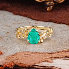 Nature-Inspired Vine-Entwined 4-Prong Teardrop-Cut Emerald Engagement Ring