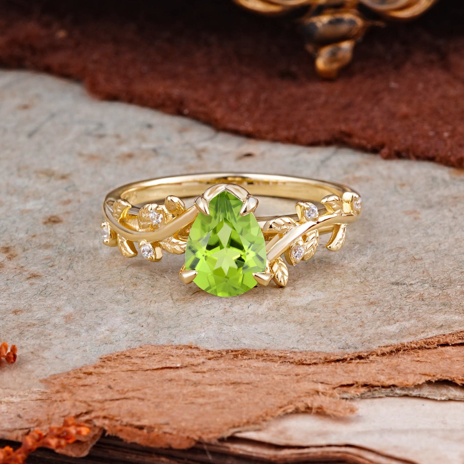 Nature-Inspired Vine-Entwined 4-Prong Pear-Cut Peridot Engagement Ring