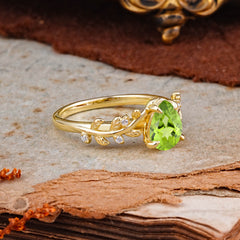 Nature-Inspired Vine-Entwined 4-Prong Teardrop-Cut Peridot Engagement Ring