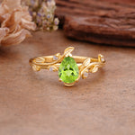 Vintage Leaf Design Pear Shaped Peridot Engagement Ring - Additional view