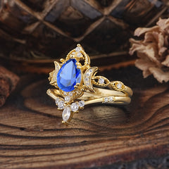 Elegant 5 Prong Pear-Cut Sapphire Engagement Ring Set
