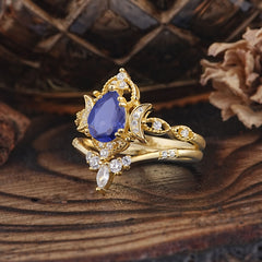 Elegant 5 Prong Pear-Cut Tanzanite Engagement Ring Set