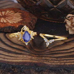 Elegant 5 Prong Pear-Cut Tanzanite Engagement Ring Set