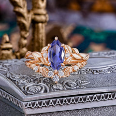 Nature-Inspired 6 Prong Marquise Tanzanite Engagement Ring Set with Vine Motif