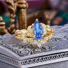 Nature-Inspired 6 Prong Marquise Sapphire Engagement Ring Set with Vine Motif