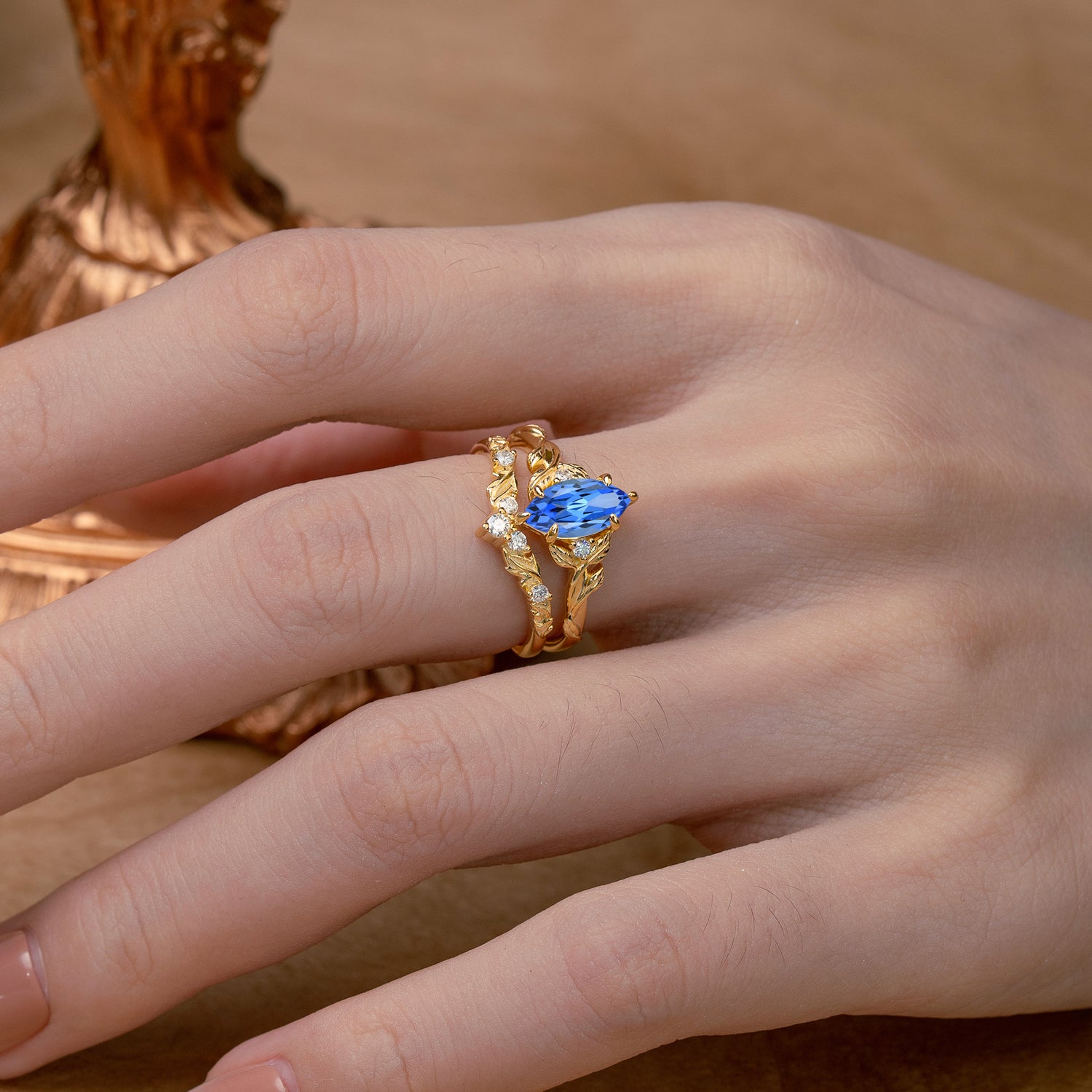 Nature-Inspired 6 Prong Marquise Sapphire Bridal Ring Set with Vine Motif
