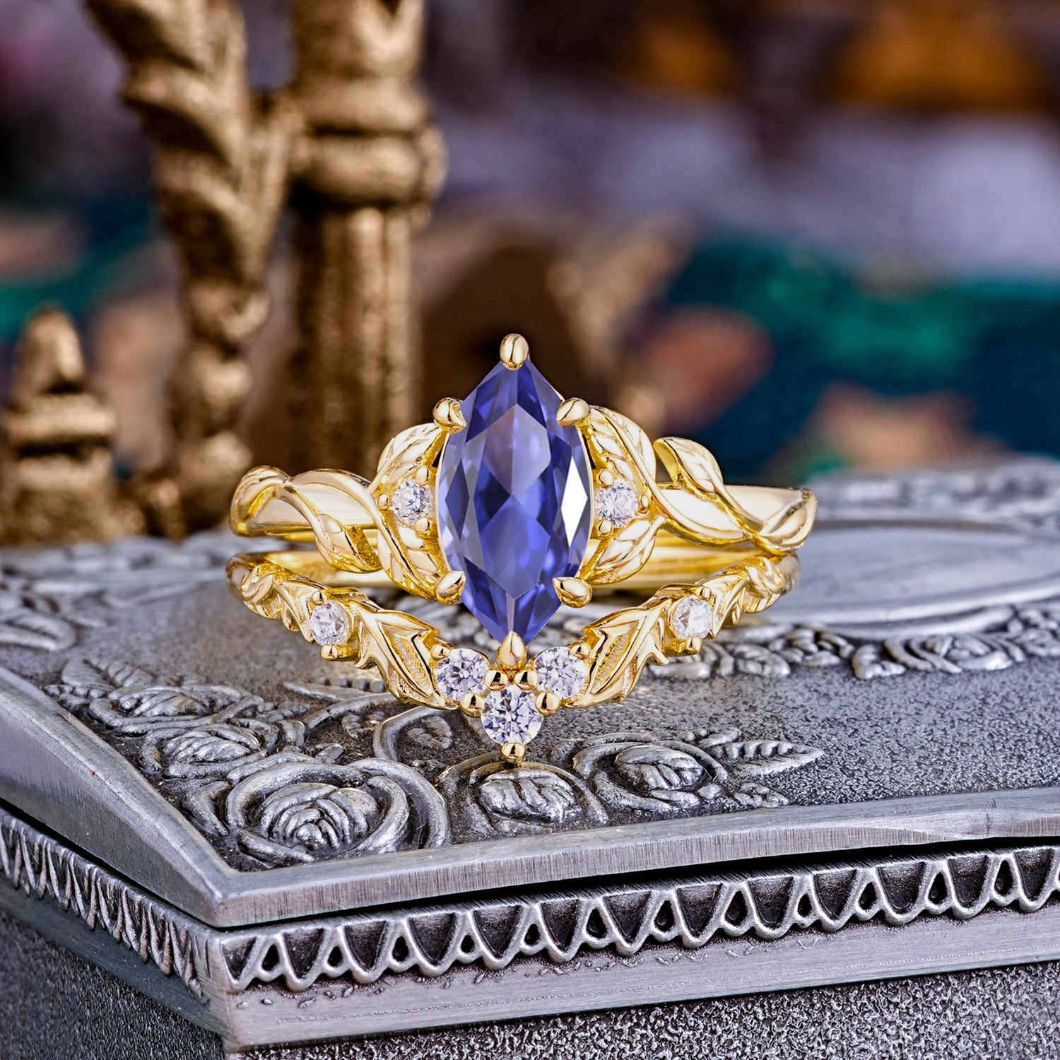 Nature-Inspired 6 Prong Marquise Tanzanite Bridal Ring Set with Vine Motif