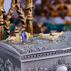 Nature-Inspired 6 Prong Marquise Tanzanite Engagement Ring Set with Vine Motif