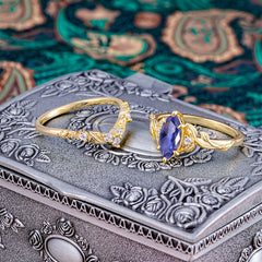 Nature-Inspired 6 Prong Marquise Tanzanite Engagement Ring Set with Vine Motif