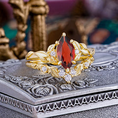 Nature-Inspired 6 Prong Marquise Garnet Engagement Ring Set with Vine Motif