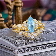 Nature-Inspired 6 Prong Marquise Aquamarine Engagement Ring Set with Vine Motif