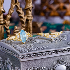 Nature-Inspired 6 Prong Marquise Aquamarine Engagement Ring Set with Vine Motif