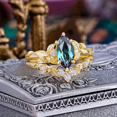 Nature-Inspired 6 Prong Marquise Alexandrite Engagement Ring Set with Vine Motif