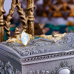 Nature-Inspired 6 Prong Marquise Moonstone Engagement Ring Set with Vine Motif