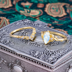 Nature-Inspired 6 Prong Marquise Moonstone Engagement Ring Set with Vine Motif