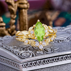 Nature-Inspired 6 Prong Marquise Peridot Engagement Ring Set with Vine Motif