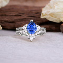 Fashion-Forward 3 Prong Luxury Pear-Cut Sapphire Engagement Ring Set