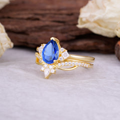 Fashion-Forward 3 Prong Luxury Pear-Cut Sapphire Engagement Ring Set