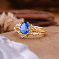 Nature-Inspired 4 Prong Pear-Cut Sapphire Ring Set