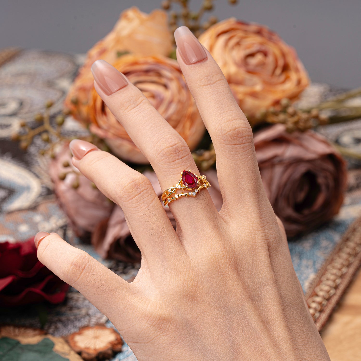 Nature-Inspired Pear-Cut Ruby Bridal Ring Set