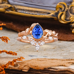 Nature-Inspired 3-Prong Oval-Cut Sapphire Engagement Ring Set with Vine Accents
