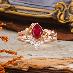 Nature-Inspired 3-Prong Oval-Cut Ruby Engagement Ring Set with Vine Accents