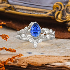 Nature-Inspired 3-Prong Oval-Cut Sapphire Engagement Ring Set with Vine Accents