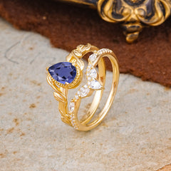 Nature-Inspired 3-Prong Oval-Cut Natural Tanzanite Engagement Ring Set With Vine Accents