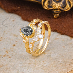 Nature-Inspired 3-Prong Oval-Cut Natural Black Rutilated Quartz Engagement Ring Set With Vine Accents