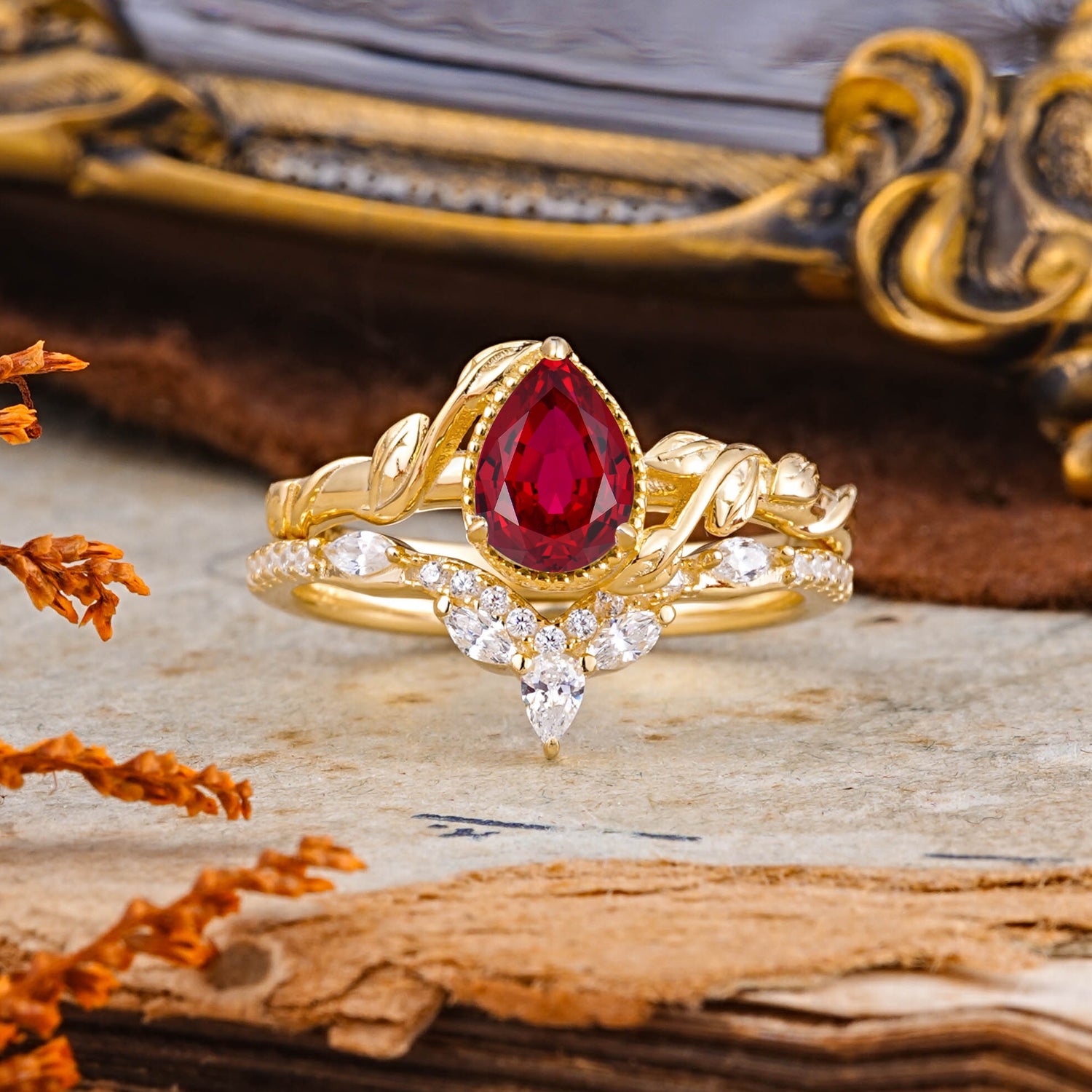 Nature-Inspired 3-Prong Pear-Cut Ruby Bridal Ring Set with Vine Accents