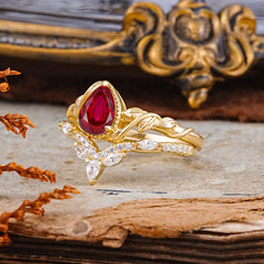 Nature-Inspired 3-Prong Oval-Cut Ruby Engagement Ring Set with Vine Accents